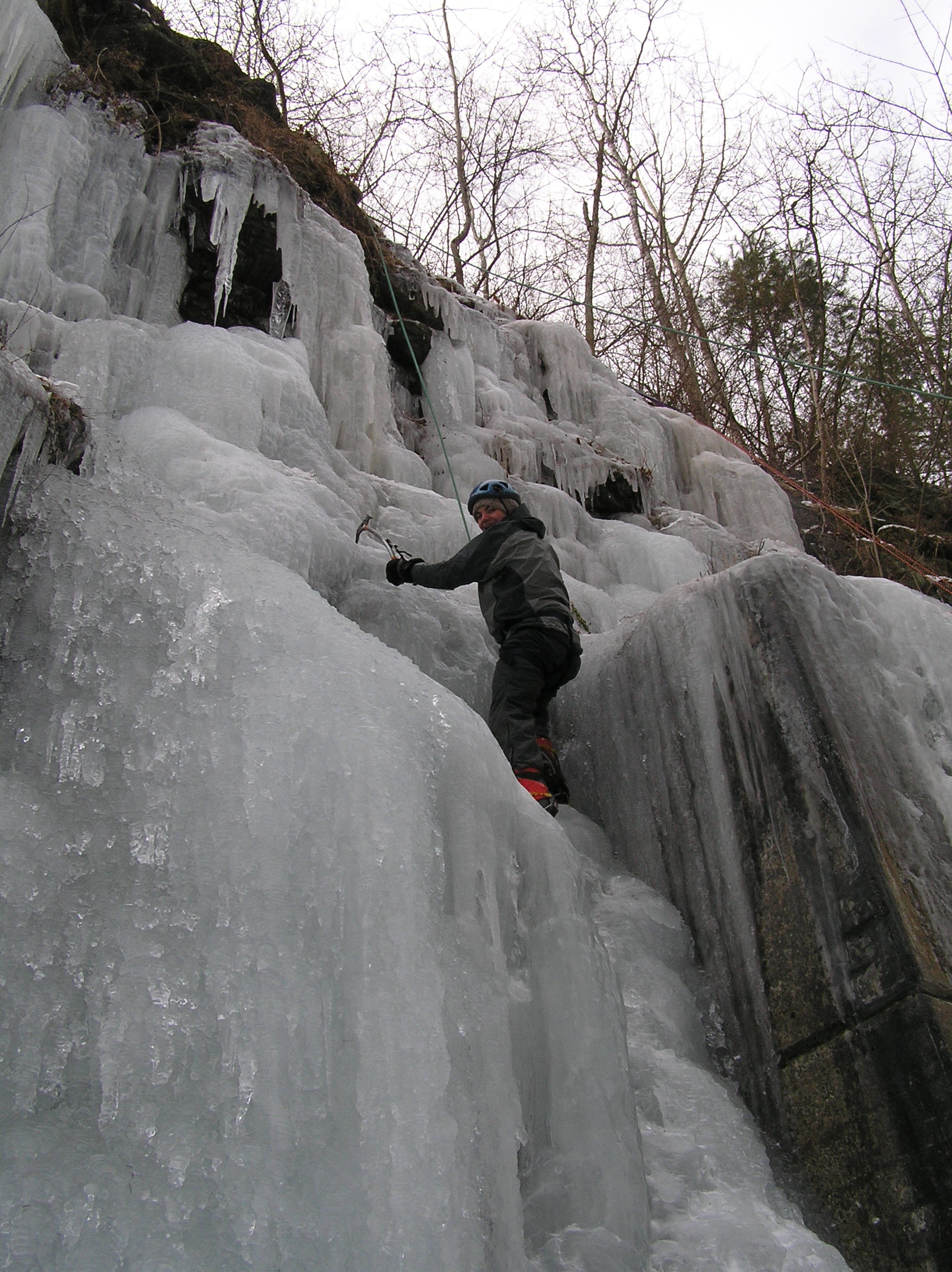 A UMass student top-roping ice